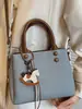 Bolso Pequeño Cuadrado Casual de Nicho Estilo Coreano para Mujer, Nuevo Elegante Bolso de Hombro Cruzado de Alto Valor Primavera 2026