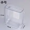 Estante de almacenamiento de pared caja de almacenamiento para teléfono móvil al por mayor acrílico transparente sin perforaciones multifuncional dormitorio mesita de noche pared