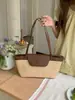 2026 Nova Bolsa de Palha Tecida Estilo Francês Nicho Retrô Casual Color Blocking Bolsa de Praia para Férias Bolsa de Ombro