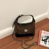 Bolsa Vintage de Camurça de Nicho para Mulheres 2026 Novo Modelo Padrão de Diamante Versátil Bolsa Transversal Color-Block da Moda Bolsa de Ombro Único Sob o Braço