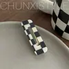 Celebridad de internet tablero de ajedrez a cuadros blanco y negro pasador sin costuras cabello suelto flequillo clip lateral femenino Corea del Sur clip de pico de pato clip de palabra