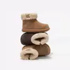Botas de nieve para niñas, zapatos grandes de algodón para niños, nuevo estilo de invierno 2026, forrados de felpa y engrosados, botas cálidas para bebés