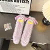 Calcetines lindos de terciopelo de coral peludo con ojos grandes otoño e invierno caricatura divertidos tridimensionales de longitud media calcetines de pelo largo pequeño monstruo calcetines de nieve