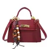 Bolsa Vintage de Nicho para Mulheres 2026 Elegante Bolsa Kelly de Retalhos em Camurça para o Dia a Dia Bolsa de Ombro Transversal