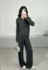 Conjunto de Punto de Dos Piezas para Mujer con Diseño de Textura Hueca de Nuevo Estilo Transfronterizo Europeo y Americano, Cárdigan con Solapa y Doble Cremallera, Pantalones de Pierna Ancha