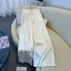 Conjunto de seda de calidad garantizada para reducir la edad, estilo chino nuevo, para primavera y otoño, para mujeres de mediana edad, con un cárdigan modificado y pantalones de pierna ancha con un toque de alta gama
