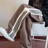 Calças esportivas estilo hiphop estilo americano masculinas primavera e outono calças listradas retrô de três barras calças casuais retas de ajuste relaxado
