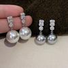 Zhengyuan Shijia Perla Diana Longitud Media Diamante Brillante Aguja Plateada Seiko Aretes Elegantes de Gama Alta Moda Año Nuevo