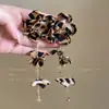 ¡Hace que la cara se vea más pequeña! Pendientes de Borlas Florales con Estampado de Leopardo para Mujer, Pendientes Exagerados con Estilo, Diseño de Nicho, Pendientes de Alta Gama