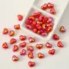 Contas acrílicas em formato de coração, cor creme, com revestimento UV e furos passantes, para pulseiras, colares e outros artesanatos DIY