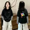 Camiseta de manga larga para niña, nuevo modelo primavera y otoño 2026, algodón puro, para niños mayores, top de otoño de imitación de dos piezas para niñas pequeñas