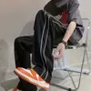 Pantalones transpirables de seda helada transfronterizos para hombre, verano, moda urbana, finos y frescos, modernos, holgados, de pierna recta, con rayas, de pierna ancha, casuales