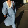 Vestido Francês Longo de Manga Comprida com Lapela Transfronteiriço para Mulheres Estilo Europeu e Americano Verão 2025 Novo Cardigã Acinturado Saia Longa