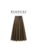 Falda plisada de cintura alta adelgazante para mujer de otoño e invierno con cinturón de traje, falda de longitud media elegante y moderna estilo coreano