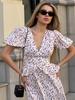 Vestido Floral Cruzado con Cuello en V Europeo y Americano 2025 Nuevo Verano Estampado Cintura Falda Larga Vestido de Manga Abullonada para Mujer