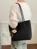 Bolso tejído de PU de moda para mujer, nuevo modelo 2026, bolso tote de gran capacidad para mujer, bolso simple para el hombro o debajo del brazo para el trabajo, transfronterizo