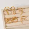 Pendientes de Acero Inoxidable con Línea Retorcida Chapados en Oro de 18 Quilates Estilo Europeo y Americano para Mujer, Joyería para Orejas de Acero de Titanio Irregular Giratoria de Diseño Único
