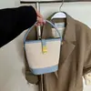 Bolsas de Mujer Transfronterizas 2026 Nueva Moda Primavera Tendencia Bolso de Mano Bolso Cubo Color Bloqueo Nicho Bolso de Hombro Cruzado