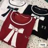 Otoño e Invierno 2023 nuevo suéter de cuello redondo manga abullonada Jacquard de lazo suelto estilo occidental top suave y lindo para mujer