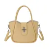 Bolsa de Mão Estilo Coreano Luxo Leve Nicho Retrô Estilo Balde Feminina Nova Coleção Primavera 2026 Moda Versátil Ombro Transversal