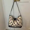 Bolsa de Lunares con Lazo de Verano Más Vendida para Mujer 2026 Nueva Versátil Bolso de Hombro Debajo del Brazo Mochila Casual Bolso para Viaje