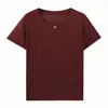 Elástico y elegante, adecuado para llevar solo o como capa interior, simple y adecuado para el uso diario, cuello redondo, transpirable, estilo suave, top de punto de manga corta para mujer en blanco