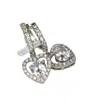 Deseo transfronterizo Europa y Estados Unidos Nuevo hebilla de oreja redonda con diamante de tres puntas hueco hebilla de oreja simple niche única venta al por mayor generación