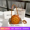 Entrega en una sola pieza bolsa redonda pequeña estampada de alta calidad de nicho 2023 linda bolsa redonda de dibujos animados bolsa de axila venta al por mayor