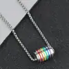 Collar de acero inoxidable de moda, colgante gota de aceite arcoíris, pequeño cilíndrico perforado, acero de titanio, joyería versátil de personalidad, fabricantes