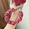 Nuevo cordón para teléfono, colección otoño/invierno, cordón colorido tejido a mano, cadena para funda de teléfono, cordón de teléfono antirrobo europeo