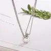 Nuevo collar de doble capa con colgante entrelazado para mujer, cadena de clavícula, accesorios de nicho de lujo ligero, diseño de nicho, moderno