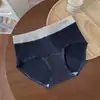 5440 # Algodón colorido Clase A estilo deportivo bloques de color tiro medio sin costuras cómodas 10A triángulo antibacteriano en la entrepierna calzones para niñas