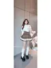 Conjunto Feminino Plus Size de Tricô com Gola Alta e Mangas Caídas, com Saia com Renda Xadrez Marrom, Modelador para Primavera e Outono
