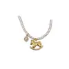Collar de Perlas Pony Dorado para Mujer Lujo Accesible de Gama Alta Cadena para Suéter Accesorios para el Cuello Otoño e Invierno 2025 Nuevo