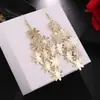 ¡Guau!Moda Transfronteriza Europea y Americana, Varios Pendientes Largos Metálicos de Borla Exagerada de Estilo Moderno con Elementos Elegantes