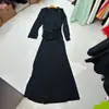 Vestido Nuevo de Solapa Falso Dos Piezas con Decoración de Hebilla Pesada Estilo Europeo y Americano Niche Metal Pesado