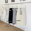 Pantalones de pierna curva para mujer, colección principios de otoño 2026, cintura elástica con cordón, pantalones de chándal de pierna ancha con costuras de contraste, pantalones largos casuales que estilizan y tienen buena caída