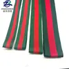 Cinta de poliéster en rojo y verde con colores entrelazados, cordones para medallas, correas para bolsos de mano, correas para equipaje, accesorios para zapatos y ropa al por mayor