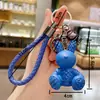 Llavero de conejo a cuadros de resina de dibujos animados exquisito para mujer, anillo de cuerda tejida lindo, colgante de bolsa con personalidad, alto valor de color, regalo al por mayor