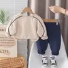 Ropa de Primavera y Otoño para Niños 2026 Nueva Moda Sudadera con Letras para Bebé Conjunto de Dos Piezas de Manga Larga para Bebés y Niños