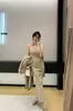 Nuevo Conjunto de Tres Piezas de Punto para Mujer Otoño/Invierno 2026, Top de Tubo + Falda de Cintura Alta + Cárdigan Largo, Estilo 'Hot Girl' de Deseo Puro