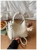 Acessório popular do verão, bolsa de mão casual feminina de cor sólida 2026, nova moda, requintada, de grande capacidade, bolsa tipo balde, bolsa transversal