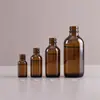 Fábrica de origen botellas de vidrio Boston marrones personalizadas con tapa de rosca, a prueba de luz, botellas vacías, estampado en pan de oro, serigrafía, acabado esmerilado y personalización avanzada