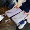Venta al por mayor de billetera larga para mujer estilo K de PU color puro sobre corazón borla plegable 70% de descuento bolso billetera de mujer