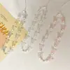 Llavero de plástico con perlas, con mariposas dulces de colores transparentes personalizados, temática de bosque estilo coreano, cadena de teléfono moderna anti-pérdida