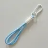 A Shangheng fornece produtos prontos de alta qualidade, como bonecas, bolsas de brinquedo, cartões, itens culturais e criativos DIY, cordões para chaves e alças de pendurar versáteis.