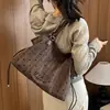 Bolsa de lona de grande capacidade para mulheres, novo estilo de verão 2026, casual e leve, adequada para aulas e deslocamentos, bolsa tote, bolsa de ombro grande