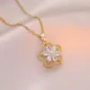 Collar para Mujer Moda Nicho Nuevo Diseño Colgante Celebridad de Internet Flor de Zircón Bauhinia Giratoria Temperamento Collar de Acero Titanio