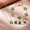 Acero de Titanio No se Desvanece 13mm Doble Cara Flor de Cuatro Hojas Juego de Cuatro Piezas Aretes, Anillo, Pulsera, Collar Venta al por Mayor Moda Tendencia