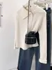 Cárdigan de punto de color liso irregular con solapa y doble cremallera para mujer, otoño e invierno, diseño único, chaqueta suéter top